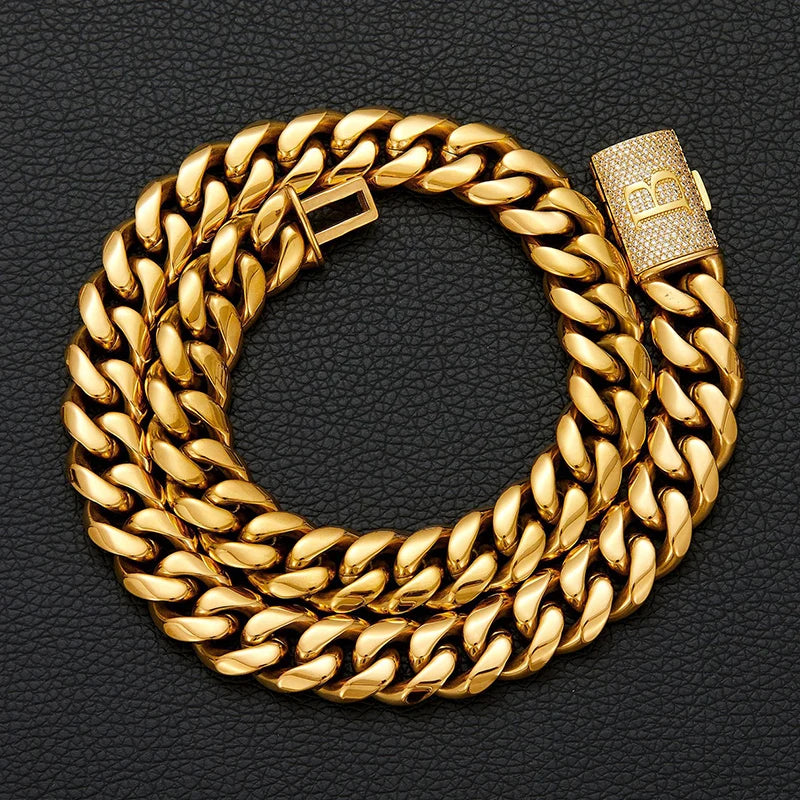 Gold chain bracelet on a black textured background