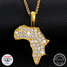 Gold pendant shaped like Africa with diamonds on a black background